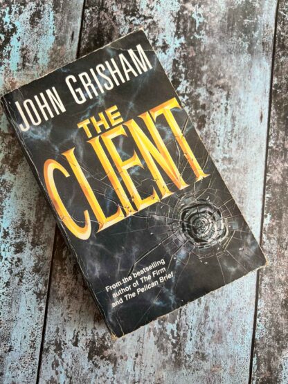 An image of the novel by John Grisham - The Client