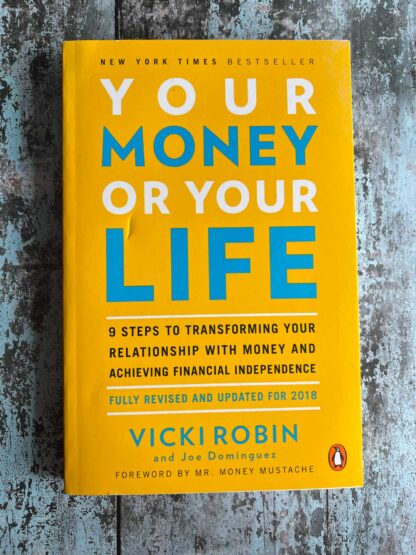 An image of a book by Vicki Robin - Your Money or Your Life