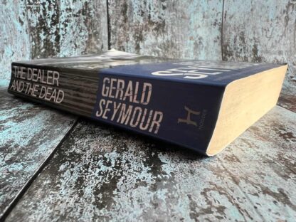 An image of a book by Gerald Seymour - The Dealer and the Dead