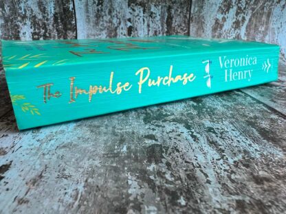 An image of a book by Veronica Henry - The Impulse Purchase