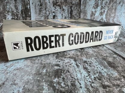 An image of a book by Robert Goddard - Never Go Back