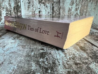 An image of a book by Meg Hutchinson - Ties of Love