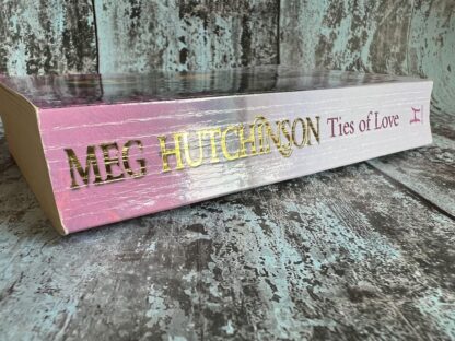 An image of a book by Meg Hutchinson - Ties of Love