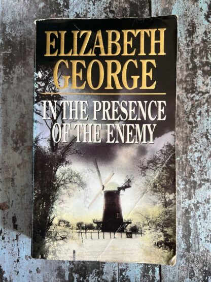 An image of a book by Elizabeth George - In the Presence of the Enemy