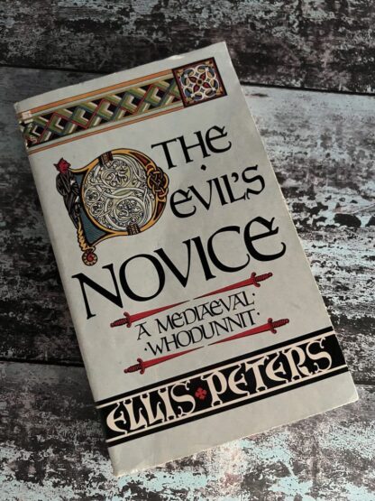 An image of a book by Ellis Peters - The Devil's Novice