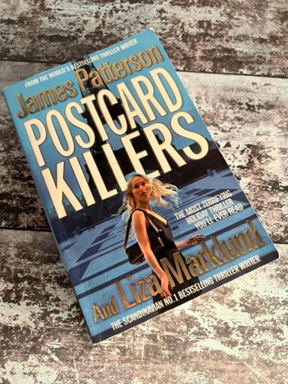 An image of a book by James Patterson - Postcard Killers