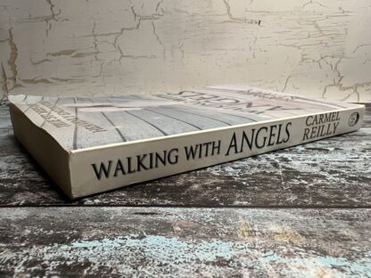 An image of a book by Carmel Reilly - Walking with Angels