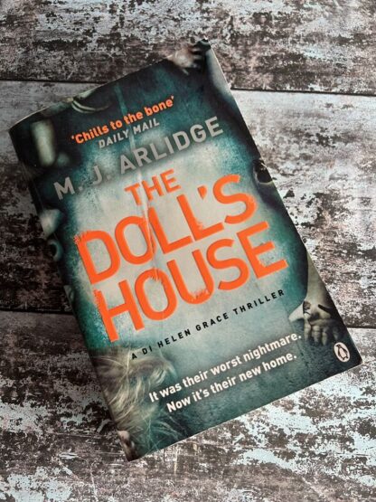 An image of a book by M J Arlidge - The Doll's House