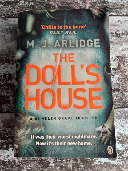 An image of a book by M J Arlidge - The Doll's House