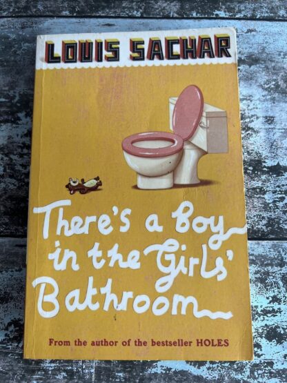 An image of a book by Louis Sachar - There's a boy in the girls bathroom