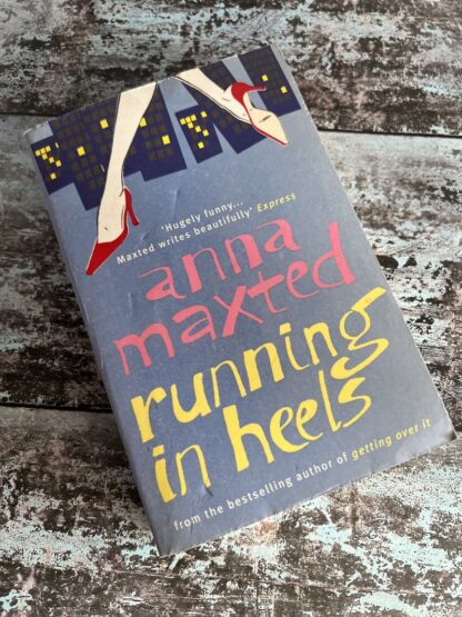 An image of a book by Anna Maxted - Running in Heels