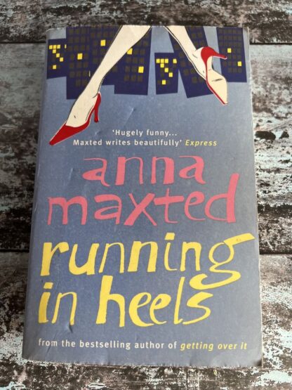 An image of a book by Anna Maxted - Running in Heels