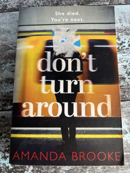 An image of a book by Amanda Brooke - Don't Turn Around