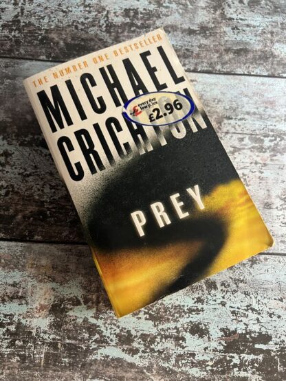 An image of a book by Michael Crichton - Prey