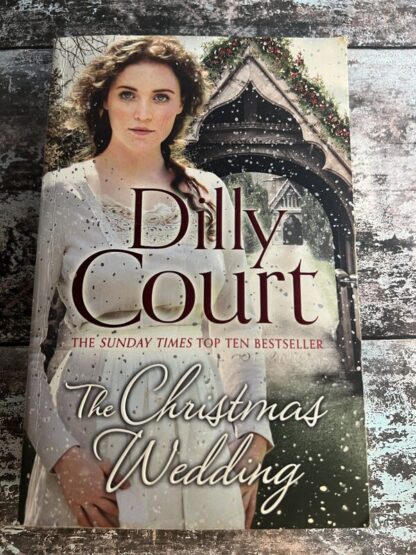 An image of a book by Dilly Court - The Christmas Wedding