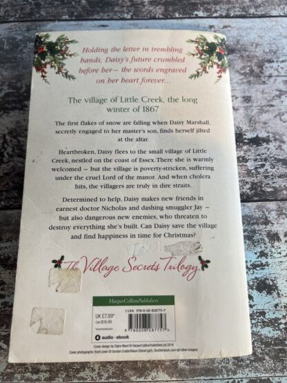 An image of a book by Dilly Court - The Christmas Wedding