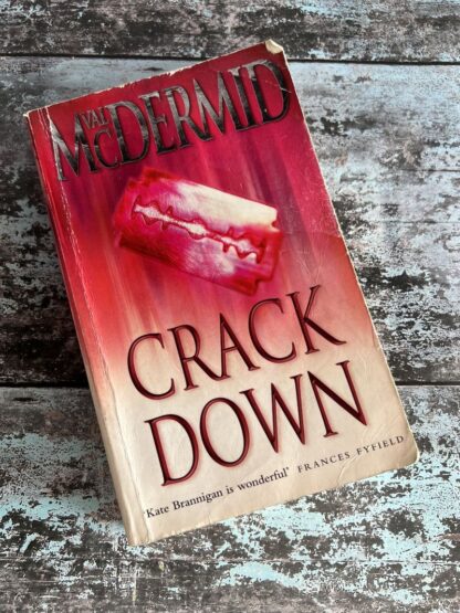 An image of a book by Val McDermid - Crack Down