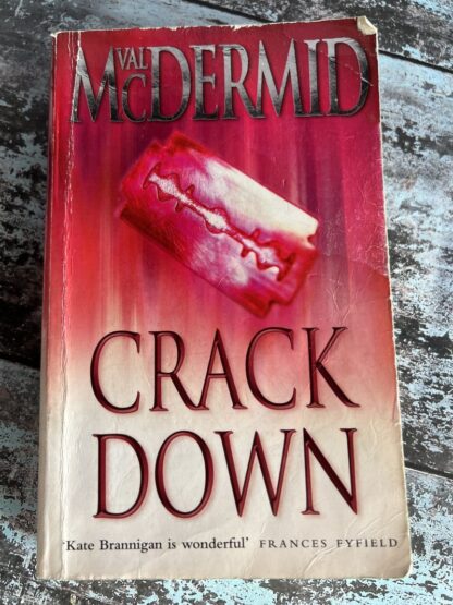 An image of a book by Val McDermid - Crack Down