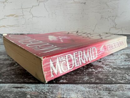 An image of a book by Val McDermid - Crack Down