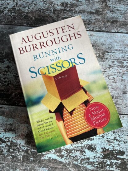 An image of a book by Augustin Burroughs - Running with Scissors