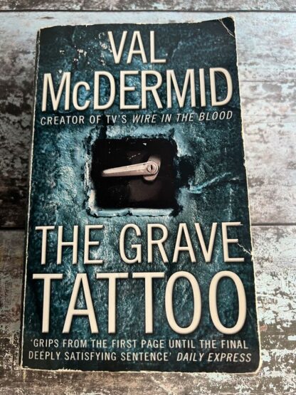 An image of a book by Val McDermid - The Grave Tattoo