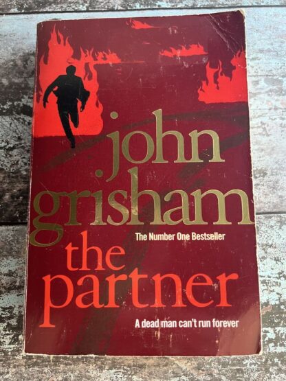 An image of a book by John Grisham - Rogue Lawyer