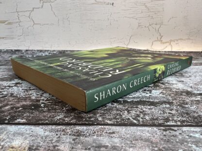 An image of a book by Sharon Creech - Chasing Redbird