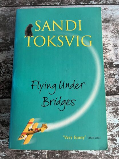 An image of a book by Sandi Toksvig - Flying Under Bridges