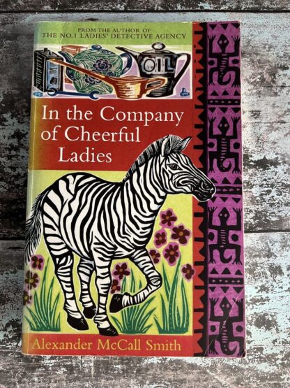 An image of a book by Alexander McCall Smith - In the Company of Cheerful Ladies