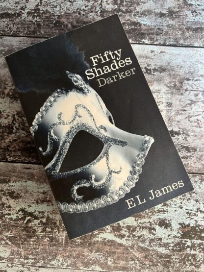 An image of a book by E L James - Fifty Shades Darker