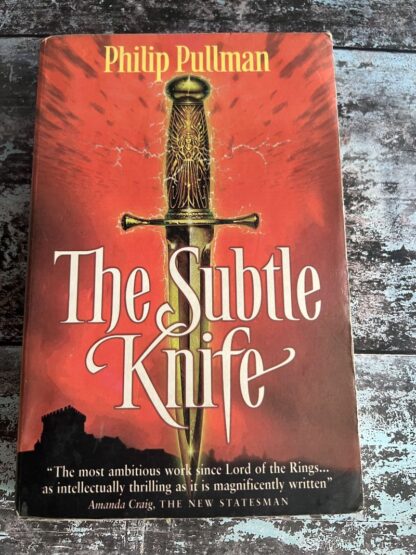 An image of a book by Philip pullman - The Subtle Knife