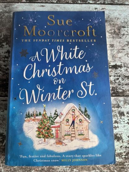 An image of a book by Sue Moorecroft - A white Christmas on Winter St