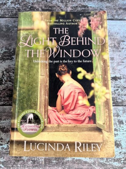 An image of a book by Lucinda Riley - The Light Behind the Window