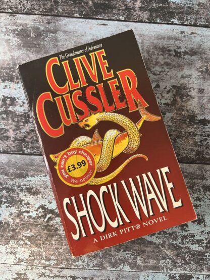An image of a book by Clover Cussler - Shock Wave