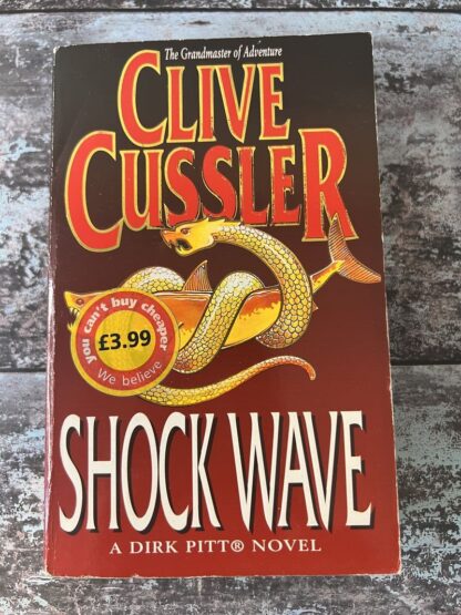 An image of a book by Clover Cussler - Shock Wave