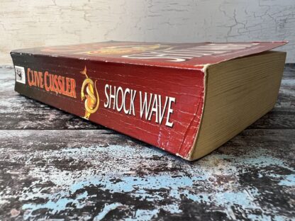 An image of a book by Clover Cussler - Shock Wave