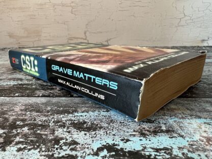 An image of a book by Max Allan Collins - CSI: Grave Matters