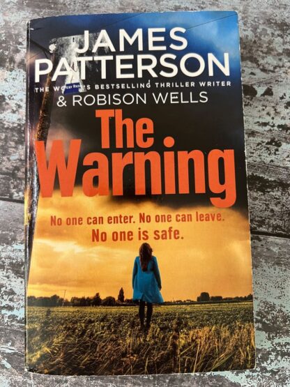 An image of a book by James Patterson - The Warning