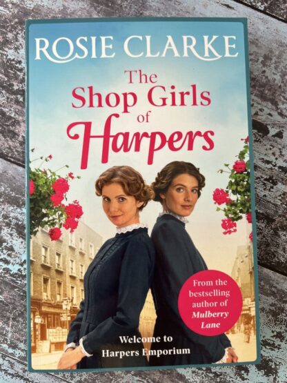 An image of a book by Rosie Clarke - The Shop Girls of Harpers
