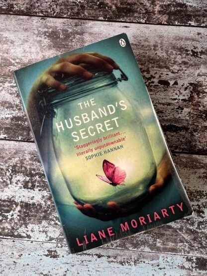 An image of a book by Liane Moriarty - The Husband's Secret