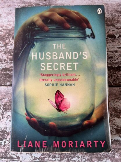 An image of a book by Liane Moriarty - The Husband's Secret