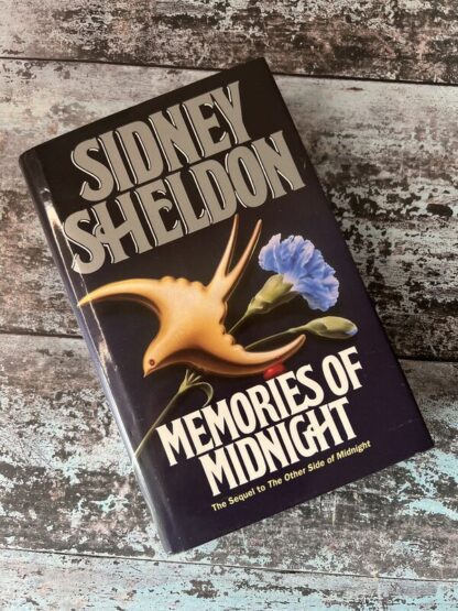 An image of a book by Sidney Sheldon - Memories of Midnight