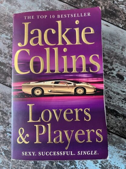 An image of a book by Jackie Collins - Lovers and Players