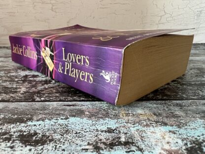 An image of a book by Jackie Collins - Lovers and Players