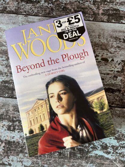 An image of a book by Janet Woods - Beyond the Plough