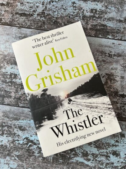 An image of a book by John Grisham - The Whistler
