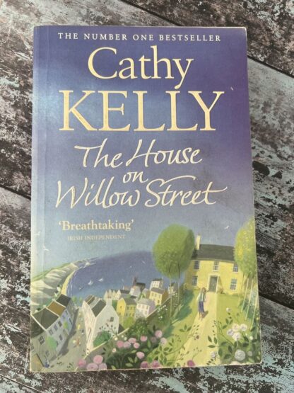 An image of a book by Cathy Kelly - The house on Willow Street