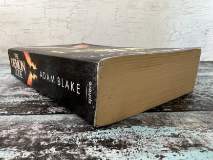 An image of a book by Adam Blake - The Demon Code