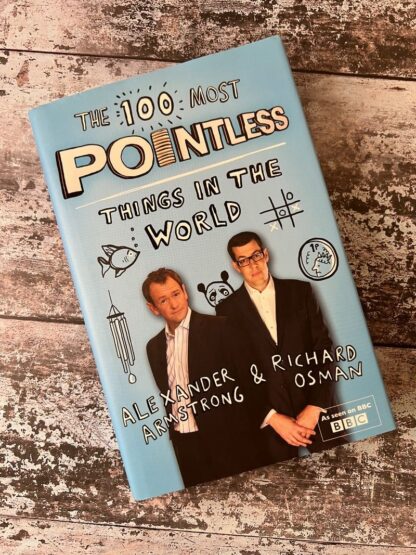 An image of a book by Alexander Armstrong and Richard Osman - The 100 most pointless things in the world