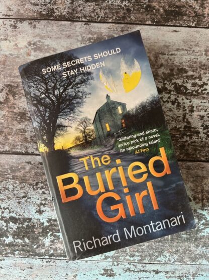 Image of a book by Richard Montanari - The Buried Girl